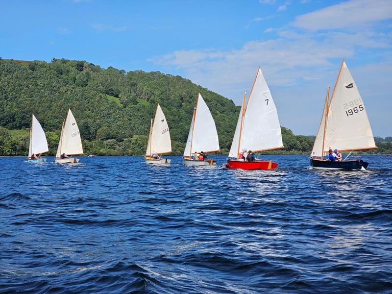 Six boats in line on a broad reach during the Gaffling Dinghy Championship at Ullswater photo copyright Mary Gibbs taken at Ullswater Yacht Club and featuring the Gaffers class