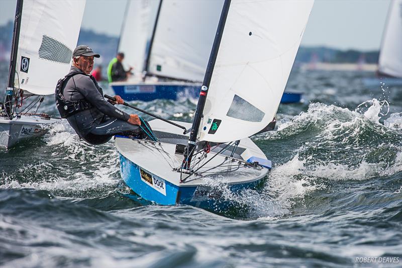 Greg Wilcox on day 3 of the OK Dinghy European Championship in Kiel, Germany photo copyright Robert Deaves taken at  and featuring the OK class