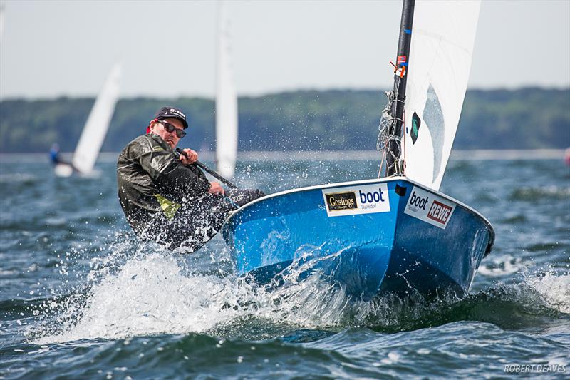 Julian Dejugnat on day 3 of the OK Dinghy European Championship in Kiel, Germany photo copyright Robert Deaves taken at  and featuring the OK class