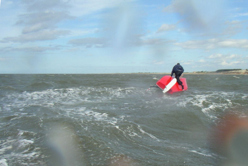 Wild conditions during the OK World Qualifier at Hunstanton photo copyright Stuart Moore taken at Hunstanton Sailing Club and featuring the OK class