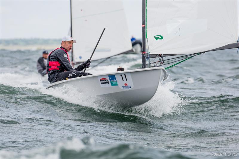 Fredrik Lööf on day 1 of the OK Dinghy World Championship photo copyright Robert Deaves taken at  and featuring the OK class