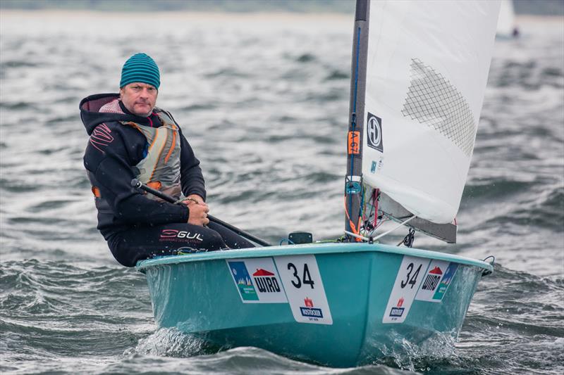 A content Jim Hunt on day 2 of the OK Dinghy World Championship photo copyright Robert Deaves taken at  and featuring the OK class