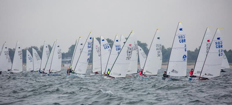 Start of race 3 on day 2 of the OK Dinghy World Championship photo copyright Robert Deaves taken at  and featuring the OK class