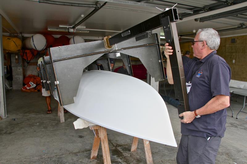 Lowering hull measuring jig - Symonite OK Worlds, Wakatere BC - February photo copyright Richard Gladwell taken at Wakatere Boating Club and featuring the OK class