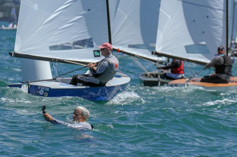 Dedicated media team member goes for the water shot - Symonite OK World Championships - Day 1, February 10, 2019 photo copyright Richard Gladwell taken at Wakatere Boating Club and featuring the OK class