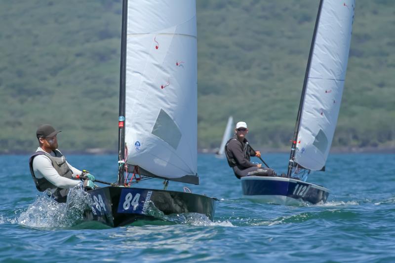 Dan Slater (112) chases race leader Andrew Phillips (84) - Symonite OK World Championships - Day 1, February 10, 2019 photo copyright Richard Gladwell taken at Wakatere Boating Club and featuring the OK class