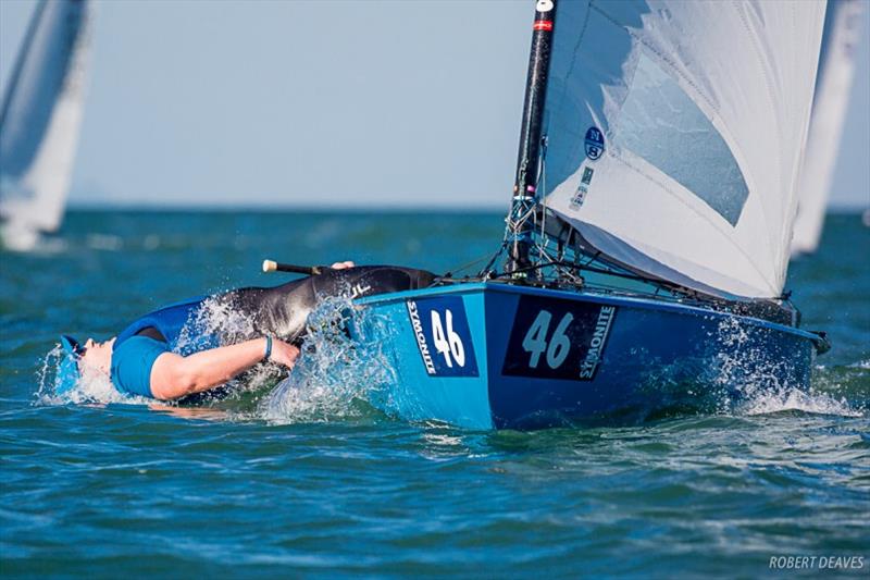 Richard Burton celebrates winning Race 3 - Symonite OK Worlds, Day 2 photo copyright Robert Deaves taken at Wakatere Boating Club and featuring the OK class