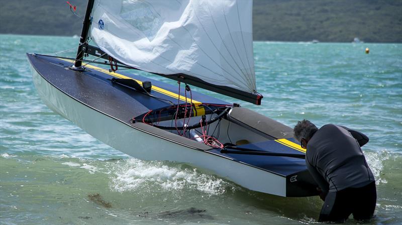 More of the Maverick is revealed rising to a wave - OK Dinghy - Wakatere BC October 25, photo copyright Richard Gladwell - Sail-World.com/nz taken at Wakatere Boating Club and featuring the OK class