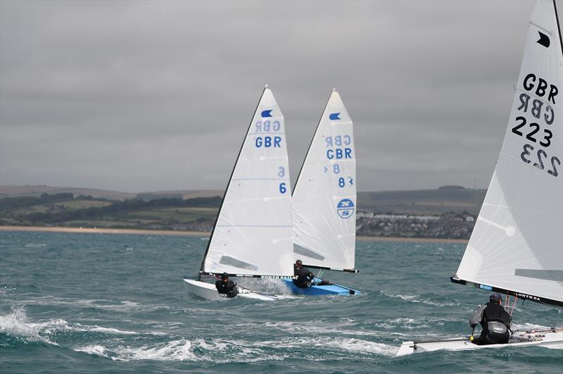 Henry chasing Richard 'Burt' Burton hard photo copyright Richard Bowers taken at  and featuring the OK class