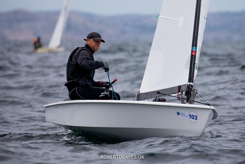 OK Dinghy Worlds in Marstrand: Niklas Edler, SWE photo copyright Robert Deaves / www.robertdeaves.uk taken at Marstrands Segelsällskap and featuring the OK class