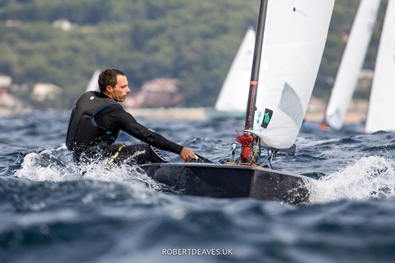 Valerian Lebrun on day 2 of the OK Dinghy Europeans in Bandol photo copyright Robert Deaves / www.robertdeaves.uk taken at Société Nautique de Bandol and featuring the OK class