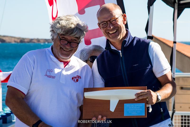 Pontus Gäbel presents a half model to club president Laurent Petetin - 2022 OK Dinghy European Championship - photo © Robert Deaves