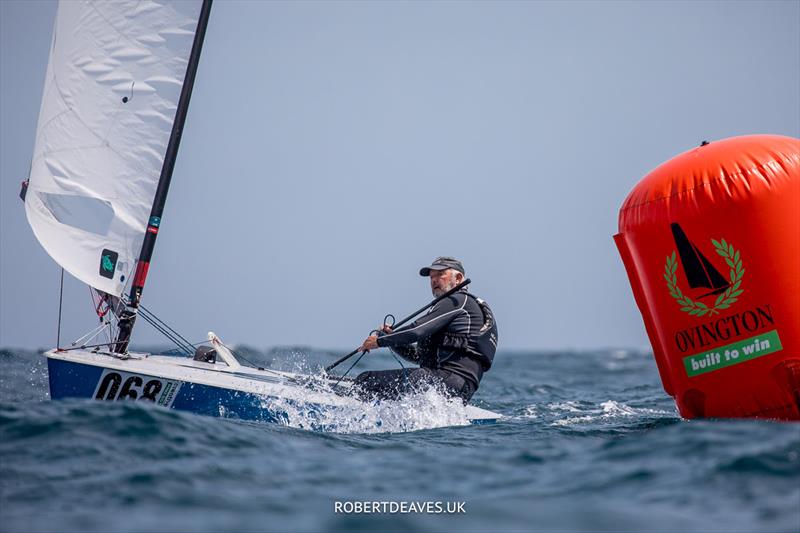 OK Dinghy Worlds practice race - Greg Wilcox, NZL photo copyright Robert Deaves / www.robertdeaves.uk taken at Lyme Regis Sailing Club and featuring the OK class