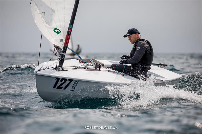 OK Dinghy Worlds Day 1 - Niklas Edler, SWE photo copyright Robert Deaves / www.robertdeaves.uk taken at Lyme Regis Sailing Club and featuring the OK class