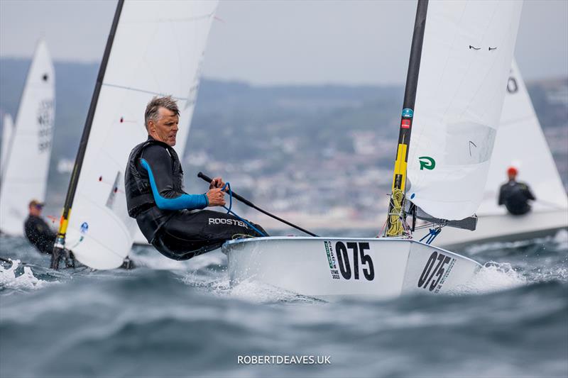 OK Dinghy Worlds Day 2 - Jens Eckardt, DEN photo copyright Robert Deaves / www.robertdeaves.uk taken at Lyme Regis Sailing Club and featuring the OK class