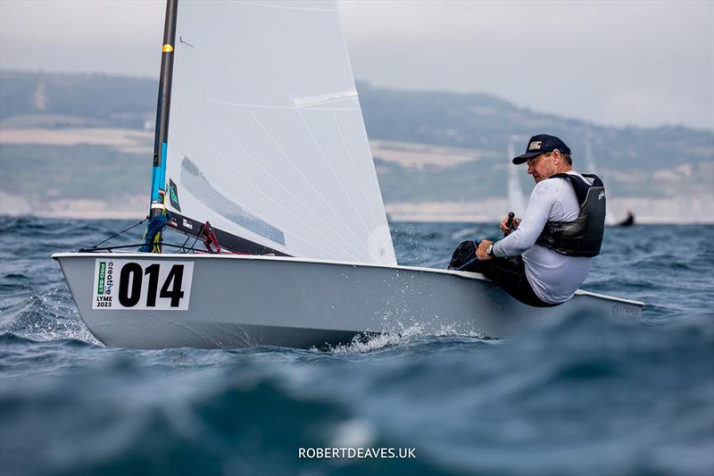 Roger Blasse, AUS, in Lyme Regis photo copyright Robert Deaves taken at Lyme Regis Sailing Club and featuring the OK class