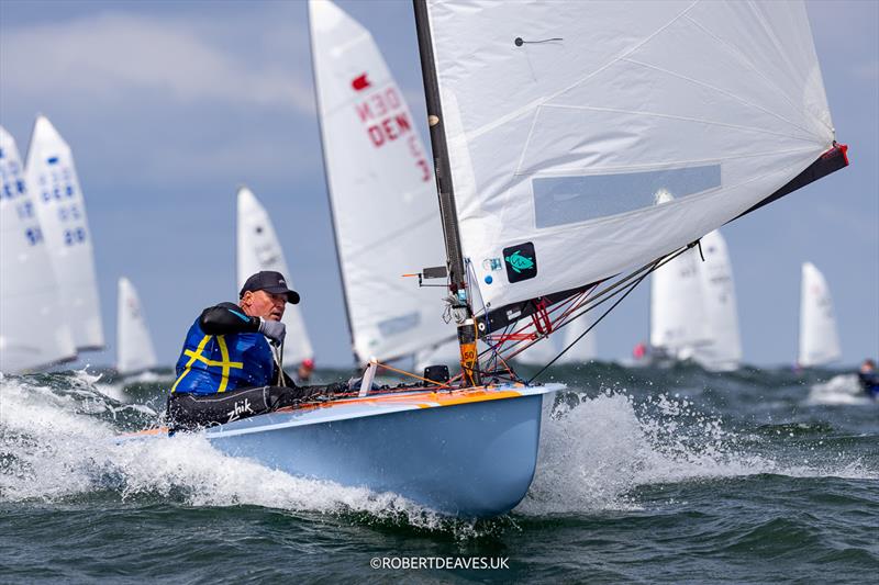 Patric Mure, SWE on day 3 of the OK Dinghy Europeans at Warnemünde photo copyright Robert Deaves / www.robertdeaves.uk taken at  and featuring the OK class