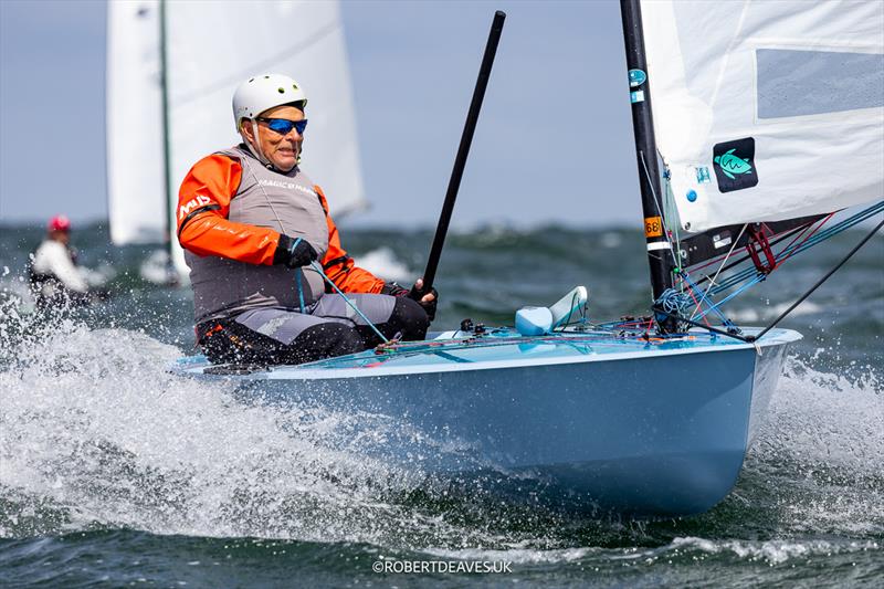 Christian Kirchner, GER on day 3 of the OK Dinghy Europeans at Warnemünde photo copyright Robert Deaves / www.robertdeaves.uk taken at  and featuring the OK class