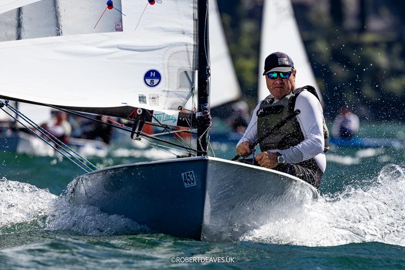 OK Dinghy Worlds at Lake Garda Day 4 - Roger Blasse photo copyright Robert Deaves / www.robertdeaves.uk taken at Circolo Vela Arco and featuring the OK class