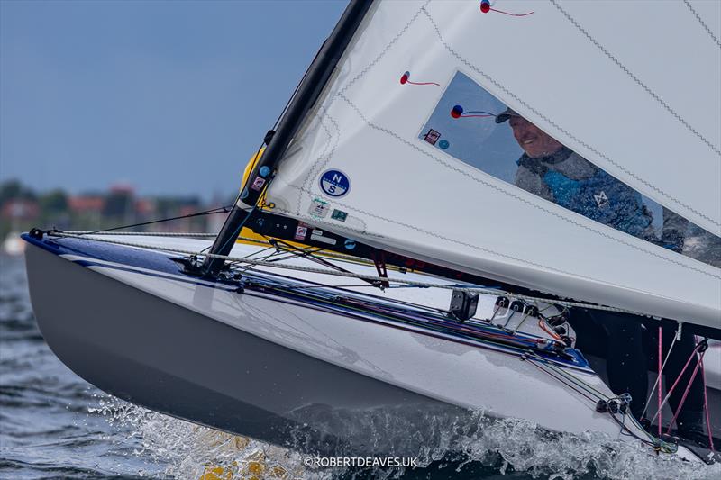 Charlie Cumbley, GBR - day 2 of the OK Dinghy Worlds in Denmark photo copyright Robert Deaves / www.robertdeaves.uk taken at Royal Danish Yacht Club and featuring the OK class