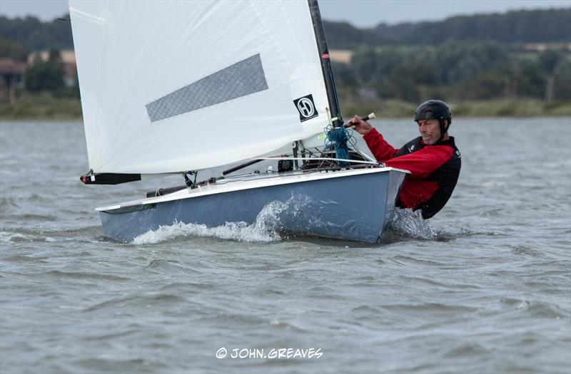 Dave Cooper fully hiked - Vaikobi Travellers Series and Richard Mason Trophy at Overy Staithe photo copyright John Greaves taken at Overy Staithe Sailing Club and featuring the OK class