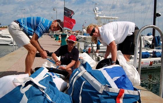 Johnny, Di and Phillippa Hutton-Squire prepare Class40 Phesheya-Racing for GOR Leg 4 photo copyright Oliver Dewar taken at  and featuring the Open 40 class