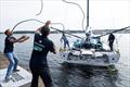 Ambrogio Beccaria, Thomas Ruyant of the Allagrande Mapei Racing team dock they race yacht in preparation for The Ocean Race Europe in Kiel, Germany