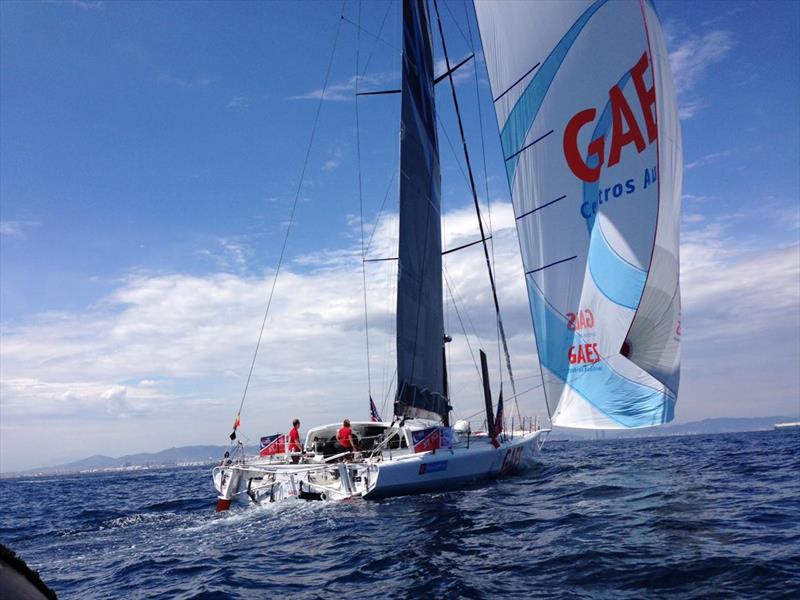 The GAES team of Anna Corbella and Gerard Marin finish the IMOCA Ocean Masters New York to Barcelona race photo copyright Christophe Favreau / OSM taken at  and featuring the IMOCA class