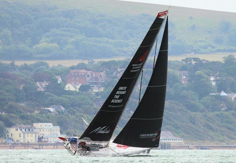 Malizia passes Hurst Castle in the 2019 Rolex Fastnet Race photo copyright Mark Jardine taken at Royal Ocean Racing Club and featuring the IMOCA class