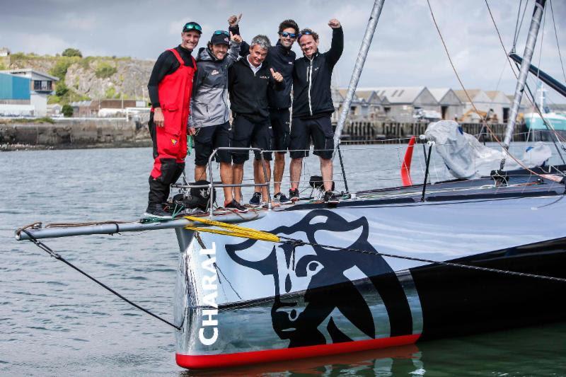 IMOCA 60 line honours for Jérémie Beyou and Christopher Pratt and their shore crew after arriving in Plymouth in the Rolex Fastnet Race photo copyright RORC / Paul Wyeth taken at Royal Ocean Racing Club and featuring the IMOCA class