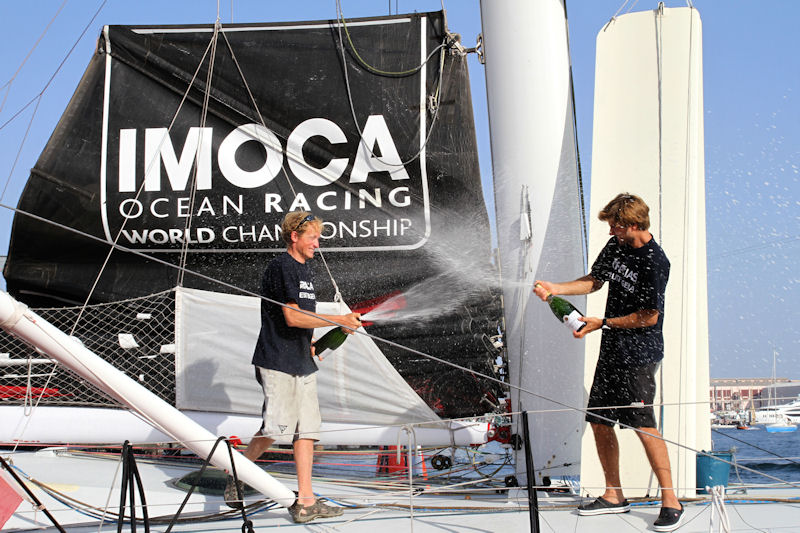 Ryan Breymaier (USA) and Boris Herrmann (GER) finish fifth in the Barcelona World Race photo copyright Manuel Medir / FNOB taken at  and featuring the IMOCA class