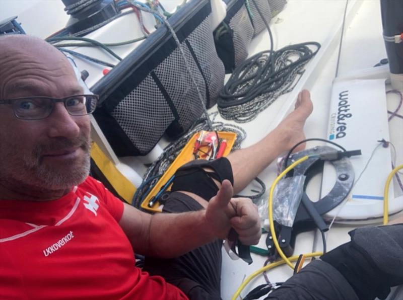 Ari Huusela tries to create one working hydrogenerator out of two non-working hydrogenerators in the Route du Rhum-Destination Guadeloupe - photo © Ari Huusela