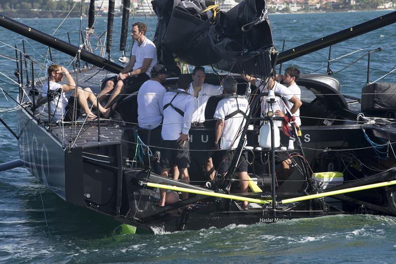 The jury join Alex on board to hand him his penalty after the Route du Rhum-Destination Guadeloupe finish photo copyright Alexis Courcoux taken at  and featuring the IMOCA class