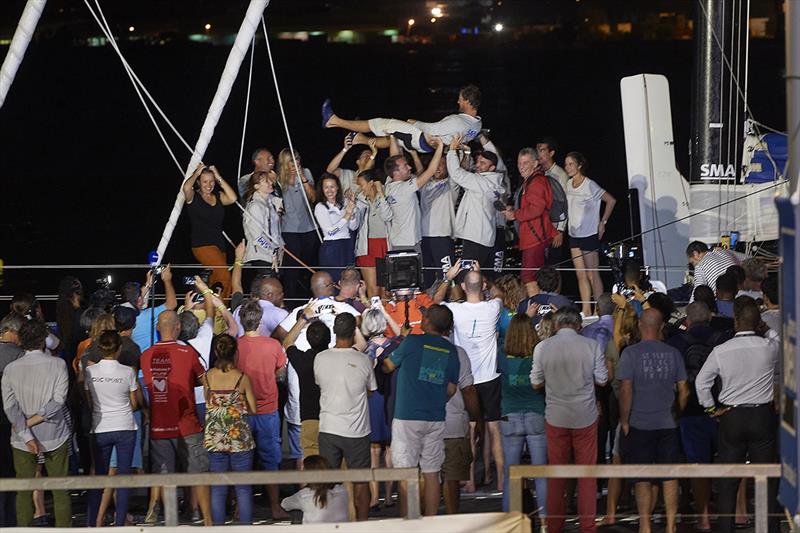 Meilhat celebrating his biggest win to date on the dock in Guadeloupe - 2018 Route du Rhum-Destination Guadeloupe photo copyright Yvan Zedda taken at  and featuring the IMOCA class