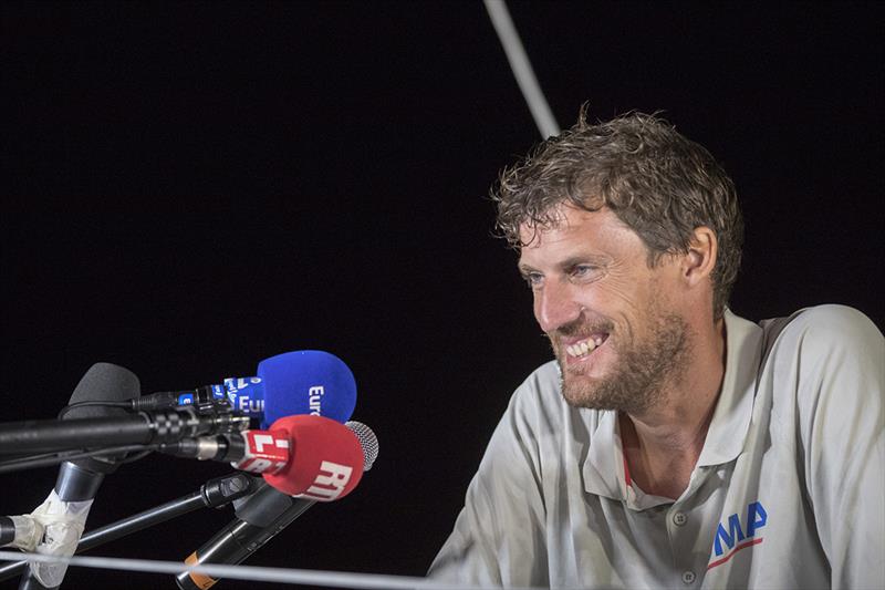 Paul Meilhat talks to media on the pontoon in Guadeloupe after winning the IMOCA class - 2018 Route du Rhum-Destination Guadeloupe photo copyright Alexis Courcoux taken at  and featuring the IMOCA class