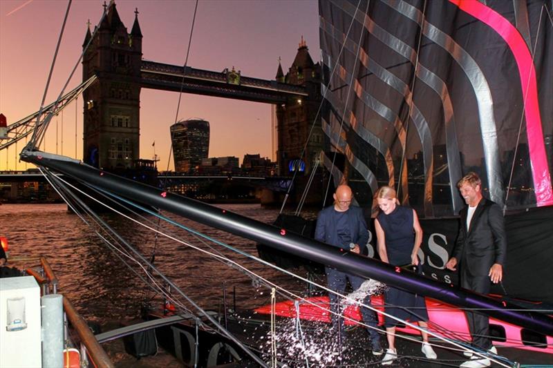 (L-R) Mr Langer, Poppy Delevingne and Alex Thomson attend the The 'Hugo Boss' Boat Christening Ceremony and Cocktail Party on September 19, in London, England photo copyright David M. Benett taken at  and featuring the IMOCA class