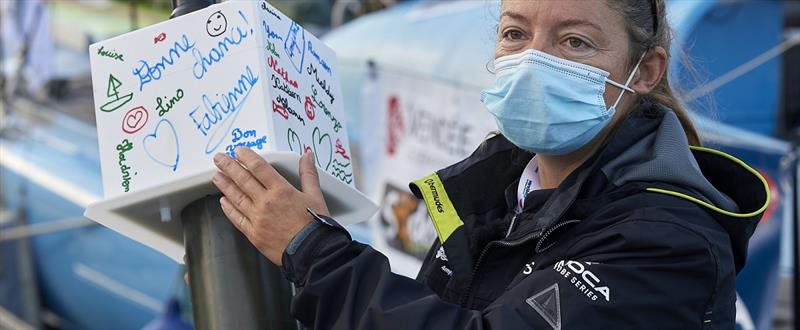 Meteo France is providing sustainability indicators buoys for skippers to immerse at specific waypoints, here Alexia Barrier, during the Vendee Globe prestart in les Sables d'Olonne, France, on October 21, 2020 photo copyright Yvan Zedda / Alea taken at  and featuring the IMOCA class