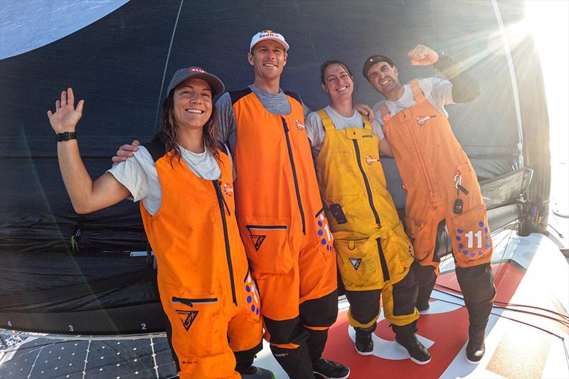 The Malama crew arrives Sunday morning in Bermuda (l to r), Elena Hight, Ian Walsh, Justine Mettraux, and Charlie Enright. - photo © Amory Ross/11th Hour Racing