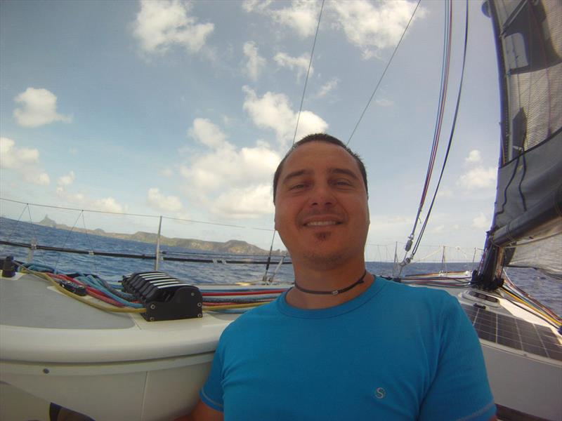 Fernando da Noronha in the background photo copyright Global Solo Challenge taken at  and featuring the IMOCA class