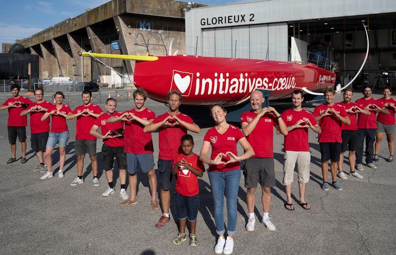 Sam Davies watches the new Initiatives-Cœur emerge from its shed in Lorient photo copyright Vincent Curutchet  taken at  and featuring the IMOCA class