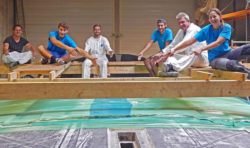 Norbert with his Innovation Yachts team laminating the deck of IY Open60AAL photo copyright Innovation Yachts taken at  and featuring the IMOCA class