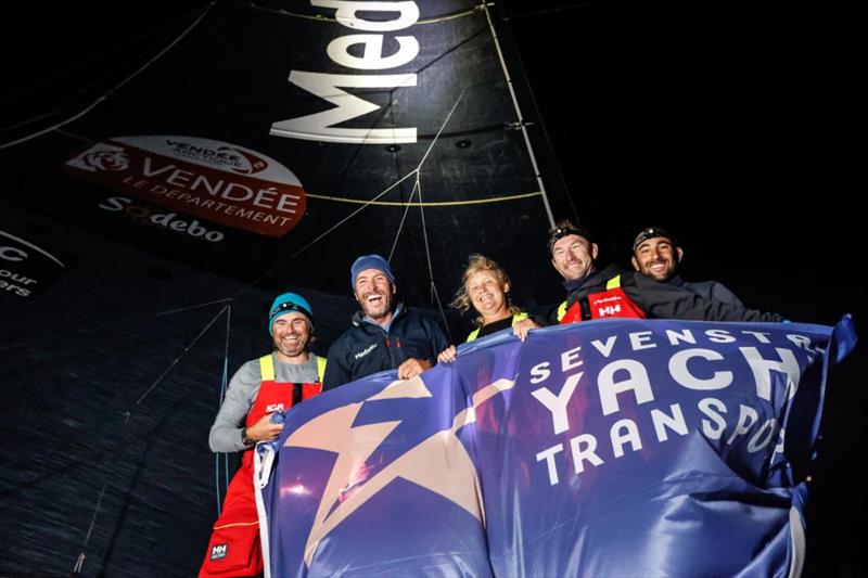 Line Honours for Team Medallia - L to R: Nick Bubb, Paul Larsen, Pip Hare, Kevin George, Ben Schwartz photo copyright Paul Wyeth / pwpictures.com taken at Royal Ocean Racing Club and featuring the IMOCA class