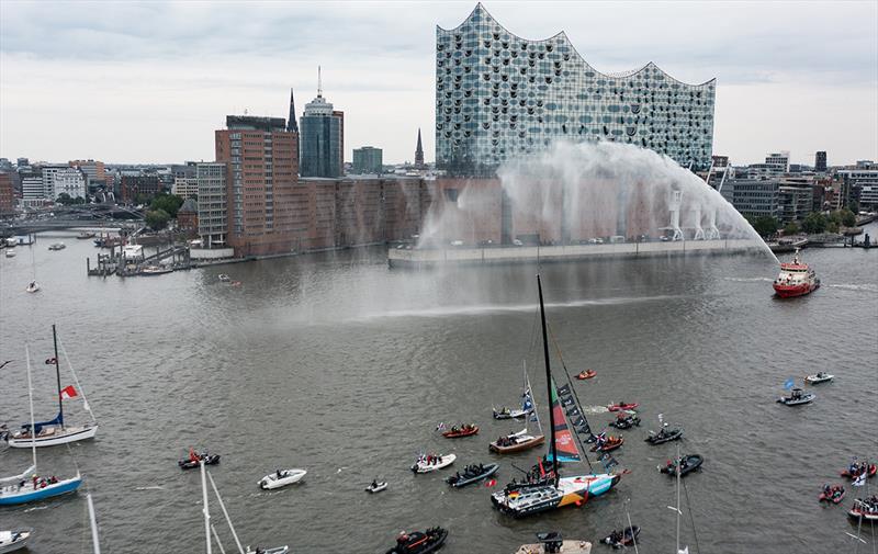 The Malizia - Seaexplorer and part of the flotilla in front of the Elbphilharmonie photo copyright Jimmy Horel taken at  and featuring the IMOCA class