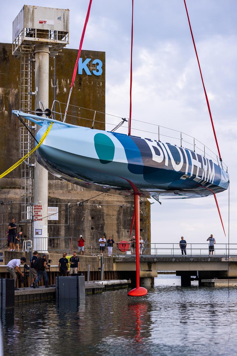 Biotherm is lowered into the water at the official launch in Lorient on 31 August 2022  photo copyright Thomas Deregnieaux - Qapture / Biotherm taken at  and featuring the IMOCA class