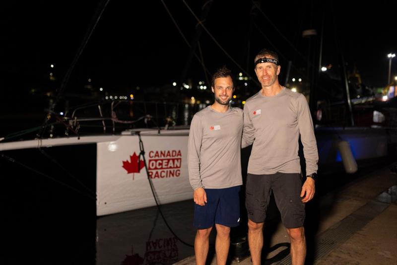 Alan Roberts and Scott Shawyer on the dock after enjoying a great result in the RORC Transatlantic Race  photo copyright Arthur Daniel / RORC taken at Royal Ocean Racing Club and featuring the IMOCA class