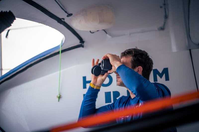28 January 2023, Leg 2 onboard Holcim - PRB Team. Tom Laperche taking a close up look at 11th Hour Racing Team behind us - photo © Georgia Schofield / polaRYSE / Holcim - PRB / The Ocean Race