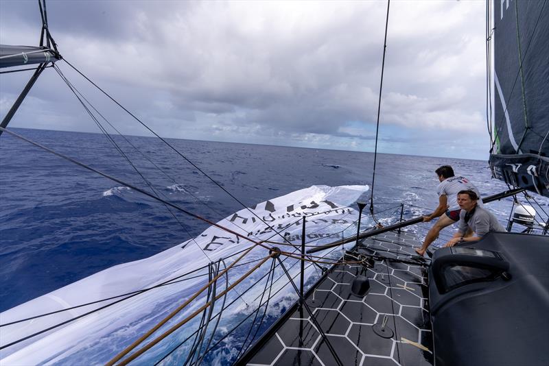 The light cloth slapped into the water, got caught on the foil and completely slowed down the black yacht - photo © Charles Drapeau / GUYOT environnement - Team Europe