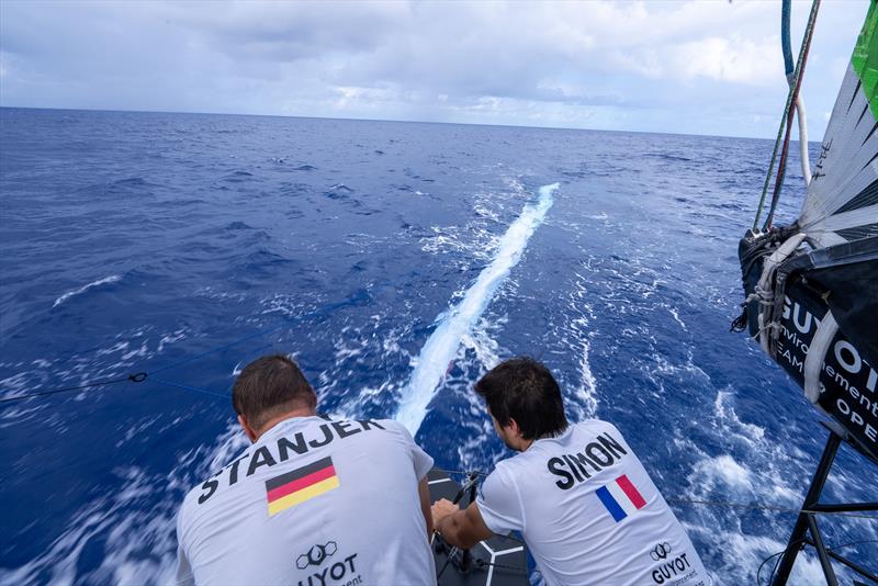 The light cloth slapped into the water, got caught on the foil and completely slowed down the black yacht photo copyright Charles Drapeau / GUYOT environnement - Team Europe taken at  and featuring the IMOCA class