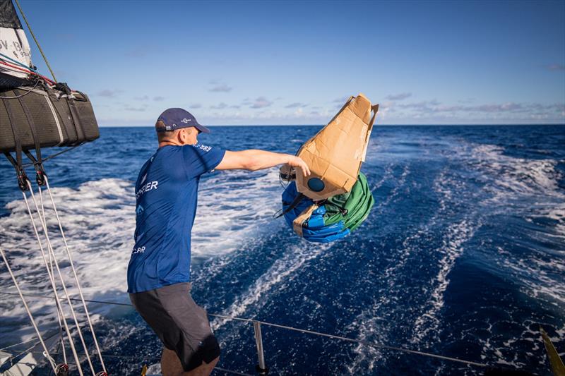 4 February 2023, Leg 2, Day 11 onboard Holcim - PRB Team. Kevin Escoffier throws the scientific floater buoy photo copyright Georgia Schofield | polaRYSE / Holcim - PRB taken at  and featuring the IMOCA class