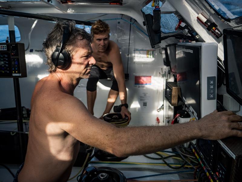 5 February 2023, Leg 2, Day 12 onboard Team Malizia. Yann Elies and Will Harris on the computer checking the foil loads as they are now sailing on a range of 25-33 knots - photo © Antoine Auriol / Team Malizia